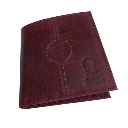 Cartera Zaldi de piel en color marrón, ideal para regalos hípicos y complementos, con detalles elegantes y acabado de alta calidad.